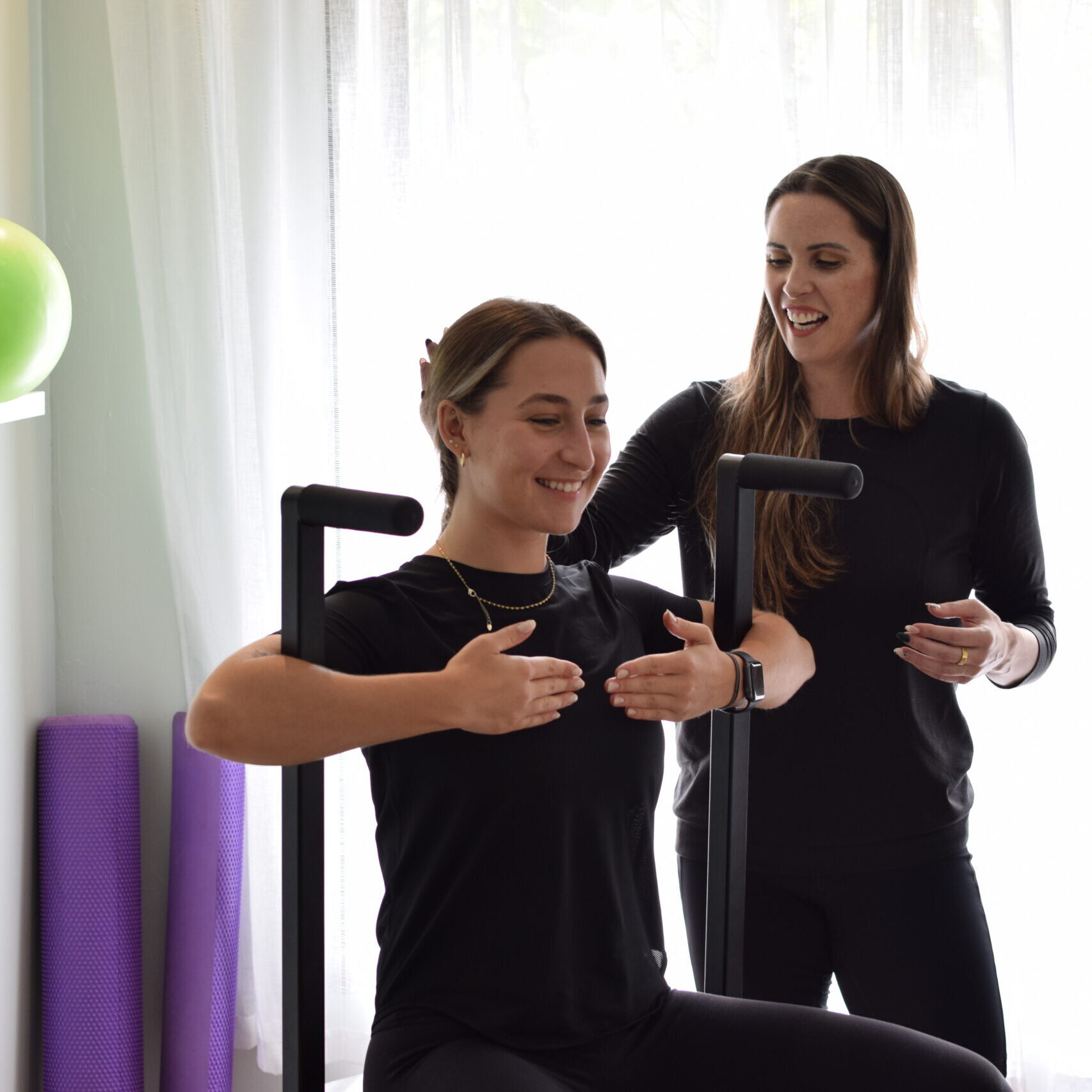 Pilates instructor in Hamilton in a one on one session